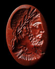 A large postclassical red jasper intaglio. Bust of an Emperor.