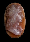 A postclassical double-layered agate cameo. Bust of a Youth.