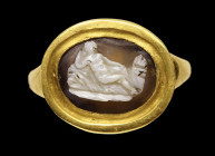 A renaissance agate cameo mounted in a modern gold ring. Reclining Venus.