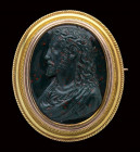 An heliotrope cameo mounted in a modern gold brooch. Bust of Christ.