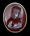 A neoclassical  glass intaglio signed PICHLER mounted on a gold seal. Eros.