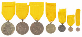 Medailles en onderscheidingen in lots - Nederland - Small collection bronze 'Trouwe Dienst' medals, consisting of four medals and three miniatures, in...