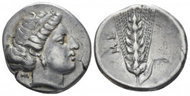 Lucania, Metapontum Nomos signed by Kri... circa 400-340, AR 21.50 mm., 7.65 g.
Head of Demeter r., wearing broad fillet and earring; behind neck, KP...