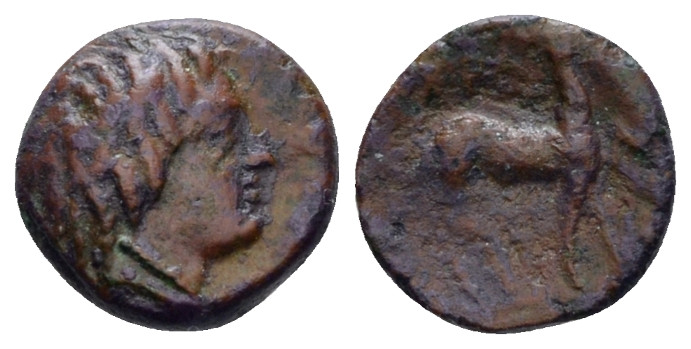 Bruttium, Caulonia Bronze circa 400, AR 10.00 mm., 0.69 g.
 Head of River god. ...