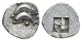 Island of Thrace, Thasos Obol irca 435-411, AR 9.00 mm., 0.58 g.
Dolphin r. on dolphin l.; in field, two pellets. Rev. Quadripartite incuse square. T...