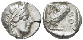 Attica, Athens Tetradrachm after 449 BC, AR 24.70 mm., 17.14 g.
 Head of Athena r., wearing Attic helmet decorated with olive leaves and palmette. Re...