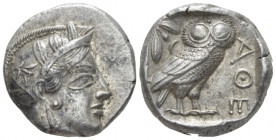 Attica, Athens Tetradrachm After 449 BC, AR 22.80 mm., 17.19 g.
 Head of Athena r., wearing Attic helmet decorated with olive leaves and palmette. Re...