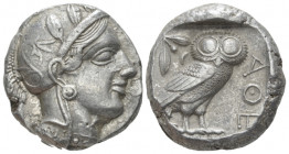 Attica, Athens Tetradrachm After 449 BC, AR 23.70 mm., 17.19 g.
 Head of Athena r., wearing Attic helmet decorated with olive leaves and palmette. Re...