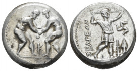 Pisidia, Selge Stater circa 350-325, AR 23.20 mm., 10.41 g.
 Two wrestlers grappling, below, K. Rev. Heracles standing r., holding club overhead and ...