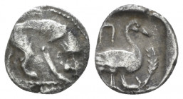 Cilicia, Mallos (?) Obol IV century BC, AR 9.00 mm., 0.65 g.
 Lion standing r. and feeding. Rev. Swan standing r.; uncertain letter or symbol above, ...