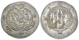 Parthia, Abbasid Governors, Anonymous Tabaristan Hemidrachm AD 783, AR 23.60 mm., 2.13 g.
 Decorated facing bust r., wearing earrings and winged crow...