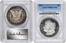 1879 Morgan Silver Dollar. Proof-65 Cameo (PCGS).

Brilliant apart from halos of steel-blue and pale pink peripheral iridescence, the obverse contra...