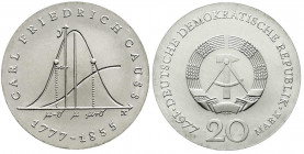Gedenkmünzen der DDR
20 Mark 1977, Gauss. Randschrift läuft rechts herum. prägefrisch. Jaeger 1563.