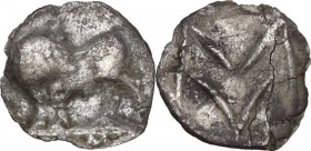 Greek Italy. Southern Lucania, Sybaris. AR Obol, 550-510 BC. HN Italy 1739; SNG ANS 854. AR. 0.29 g. 9.00 mm. Reverse lightly creased, otherwise. Good...