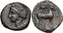 Punic Sardinia. AE Unit, c. 360-330 BC. Lulliri pl. 1, 16/17; SNG Cop. 119. AE. 3.07 g. 17.00 mm. Three pellets before horse on reverse. Good VF/About...