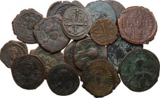 The Byzantine Empire. Lot of 17 unclassified AE denominations; including: Justin, Justinian I, Maurice Tiberius, Phocas and Anonymous Folles. VF:About...
