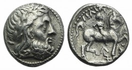 Celtic, Danube Region, imitating Philip II of Macedon, c. 3rd century BC. AR Tetradrachm (24mm, 11.67g, 6h). Laureate head of Zeus r. R/ Rider on hors...