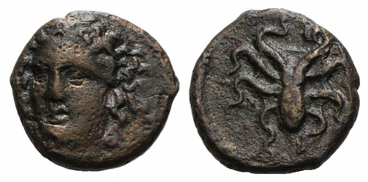 Sicily, Syracuse, c. 415-405 BC. Æ Tetras (12mm, 1.89g, 3h). Head of nymph facin...