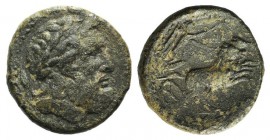 Sicily, Syracuse. Roman rule, after 212 BC. Æ (21mm, 6.70g, 12h). Laureate head of Zeus r.; grain ear behind behind. R/ Nike driving galloping biga r....