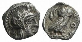 Attica, Athens, c. 454-404 BC. AR Obol (8.5mm, 0.66g, 3h). Helmeted head of Athena r. R/ Owl standing r., head facing; olive sprig and crescent behind...