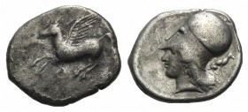 Corinth, c. 400-375 BC. AR Stater (23mm, 8.22g, 7h). Pegasos flying l. R/ Helmeted head of Athena l.; behind, hound seated r. Pegasi 135; BCD Corinth ...