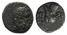 Pontos, Amisos, time of Mithradates VI, c. 85-65 BC. Æ (10mm, 1.15g, 1h). Laureate head of Herakles r. R/ Club and quiver crossed; monogram to lower l...