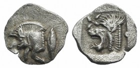 Mysia, Kyzikos, c. 450-400 BC. AR Hemiobol (9mm, 0.38g, 12h). Forepart of boar l.; tunny to r. R/ Head of lion l.; star to l.; all within incuse squar...