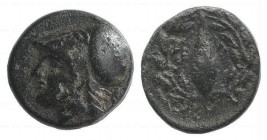 Aeolis, Elaia, mid 4th-3rd century BC. Æ (9mm, 1.18g, 9h). Helmeted head of Athena l. R/ Grain-seed within olive-wreath. SNG Copenhagen 171-2. Near VF...