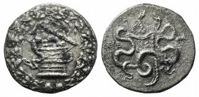 Ionia, Ephesos, c. 180-67 BC. AR Cistophoric Tetradrachm (28mm, 11.38g, 12h), 160-150 BC. Cista mystica with serpent; all within ivy wreath. R/ Two se...