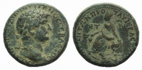 Hadrian (117-138). Cappadocia, Tyana. Æ (25mm, 12.38g, 12h), year 20 (135/6). Laureate head r. R/ Tyche seated l., holding ears of corn and resting on...