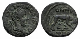 Gallienus (253-268). Troas, Alexandria. Æ (20mm, 5.89g, 6h). Laureate, draped and cuirassed bust r. R/ She-wolf standing r., suckling Twins. Bellinger...