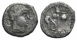 Cn. Domitius Calvinus, Osca, 39 BC. AR Denarius (19mm, 3.47g, 9h). Head of Hercules r. R/ Emblems of the pontificate: simpulum, aspergillum, axe and a...