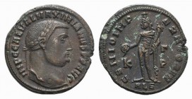 Maximinus II (309-313). Æ Follis (24mm, 6.32g, 6h). Alexandria, 309-310. Laureate head r. R/ Genius standing l., holding patera and cornucopiae; K-Γ/P...