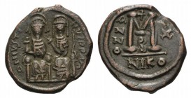 Justin II and Sophia (565-578). Æ 40 Nummi (29mm, 11.62g, 6h). Nicomedia, year 10 (574/5). Crowned and cuirassed bust facing, holding cross on globe a...