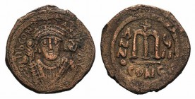 Tiberius II Constantine (578-582). Æ 40 Nummi (31mm, 11.62g, 6h). Constantinople, year 8 (581/2). Crowned facing bust, wearing consular robes, holding...