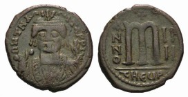 Maurice Tiberius (582-602). Æ 40 Nummi (31mm, 12.87g, 6h). Theoupolis (Antioch), year 4 (585/6). Crowned facing bust, wearing consular robes, holding ...