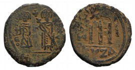 Phocas (602-610). Æ 40 Nummi (29mm, 11.35g, 6h). Cyzicus, year 1 (602-603). Phocas and Leontia standing facing, the Emperor holding globus cruciger, t...