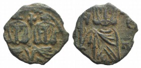 Constantine V (741-775). Æ 40 Nummi (18mm, 2.59g, 6h). Syracuse, 757-775. Crowned facing busts of Constantine and Leo IV, each wearing chlamys and hol...