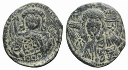 Michael VII Ducas (1071-1078). Æ 40 Nummi (25mm, 4.14g, 6h). Constantinople. Bust of Christ Pantokrator facing; star to l. and r. R/ Crowned bust of M...