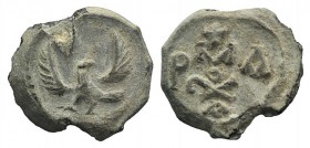 Byzantine Pb Seal, c. 7th-12th century (22mm, 7.36g, 12h). Eagle standing facing, head r., wings spread. R/ MA / P - monogram / A; cross above. VF