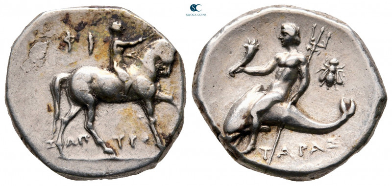 Calabria. Tarentum circa 272-235 BC. 
Nomos AR

20 mm, 6,41 g

Naked rider ...
