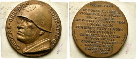 VENTENNIO FASCISTA (1922-1943). Medaglia anno XIII Grandi Manovre in Alto Adige Trento. D/ busto elmato a sinistra di Mussolini; CREDERE OBBEDIRE COMB...