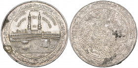 Saudi Arabia, silver commemorative medal for the Haj Pilgrimage, view of the Ka‘aba with pilgrims, rev., religious legends, 15.03g, 38mm, almost extre...