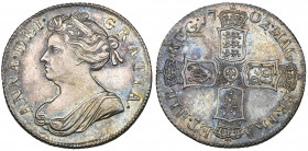 *Anne, shilling, 1702, first bust left, plain below, rev., plain in angles (E.S.C. 1129; Bull 1386; S. 3584), extremely fine and blue-toned, with a st...