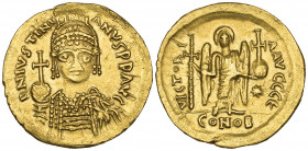 *Justinian I (527-565), solidus, Constantinople, facing bust, rev., angel standing facing holding long cross and globus cruciger; officina E, 4.34g (D...