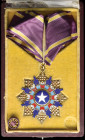 *China, Order of the Brilliant Star, Fourth Class, neck badge, in gilt and enamels, with 2 golden stars above central white star, width 60mm, in origi...