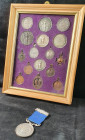 Miscellaneous Shooting Medals and Prizes (17), in silver (9) and bronze (8), all but one contained within a glazed frame for display, some engraved an...