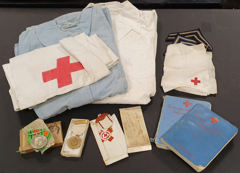 A WW2 Nursing Pair with original Nursing Manuals, Paperwork and Uniforms to Sect...