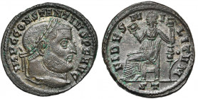 CONSTANCE CHLORE Auguste (305-306), AE follis, 305, Ticinum. D/ IMP C CONSTANTIVS PF AVG T. l. à d. R/ FIDES MILITVM/ ST Fides assise à g., ten. deux ...