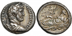 EGYPTE, ALEXANDRIE, Hadrien (117-138), bill. tétradrachme, 132-133. D/ B. l., dr., cuir. à d. R/ Le Nil étendu à g., ten. un lotus et une corne d''abo...